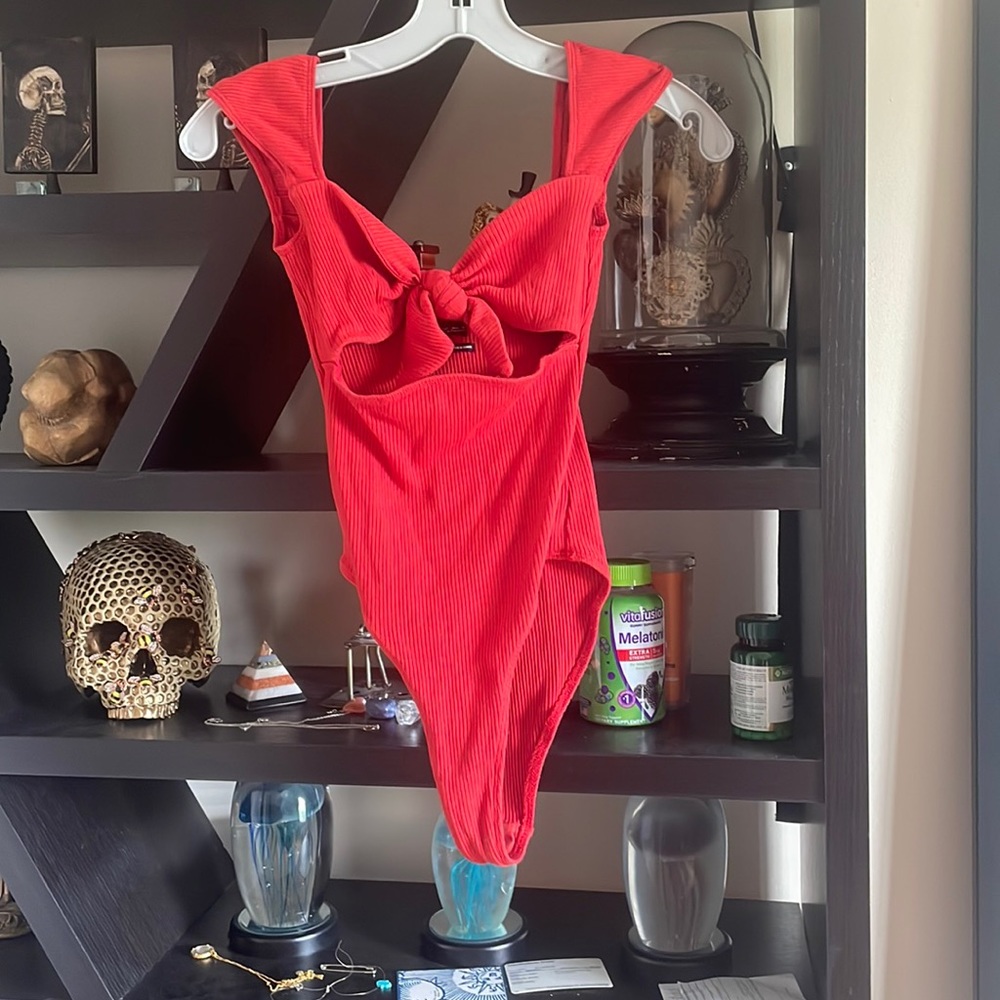 Bodysuit size small ribbed with tie in middle cut out